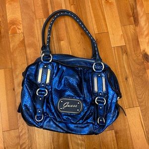 Guess vintage eye catching bag with dust bag